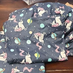 Size twin unicorns in space sheet set. Microfiber